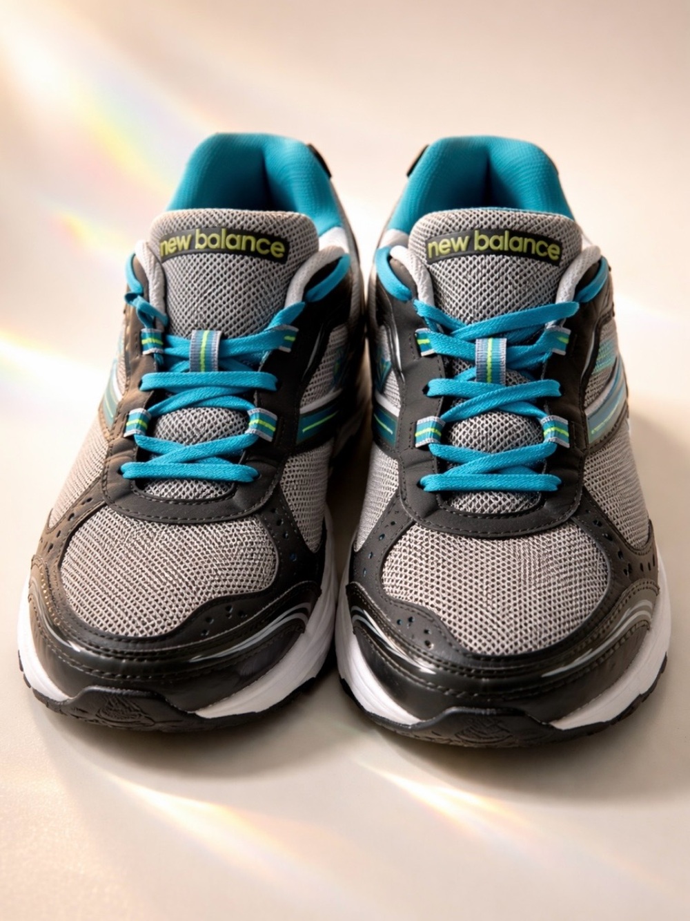 S14.   New Balance men’s Sneakers in Gray and Teal